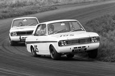 Graham Hill and Jacky Ickx in Lotus Cortinas, 1967 Gold Cup