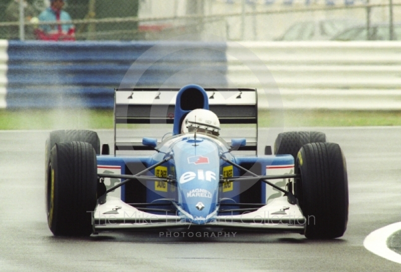 Martin Brundle, Ligier Renault JS39, seen during wet qualifying at Silverstone for the 1993 British Grand Prix.
