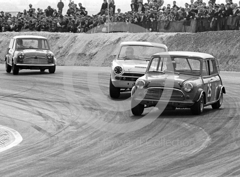 Tony Youlten, Cars and Car Conversions Mini Cooper S, and Barry Pearson, Lotus Cortina, Easter Monday meeting, Thruxton, 1968.
