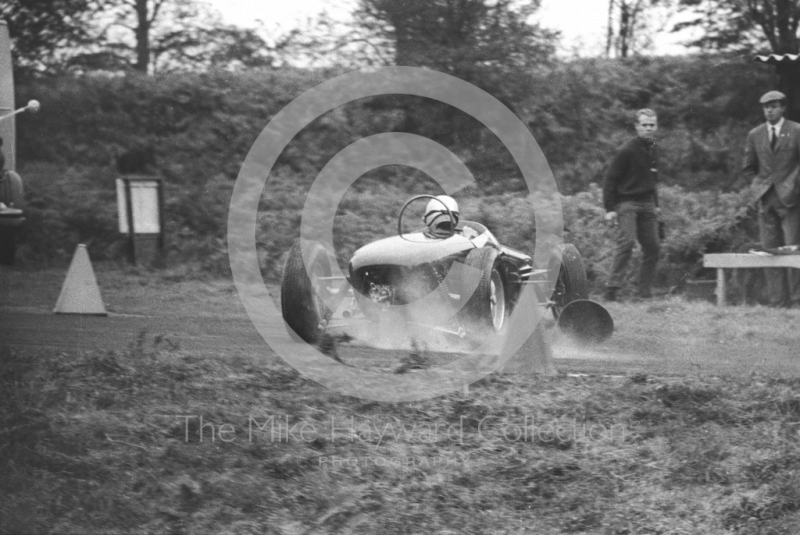 A car spins off the track, Loton Park hill climb, 1964.