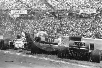 Christian Danner, Arrows A8; Jonathan Palmer, Zakspeed 861; and Thierry Boutsen, Arrows A8; after first lap accident, Brands Hatch, British Grand Prix 1986.
