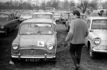 Mike Hayward with Pentax SV and 105mm pre-set lens, Oulton Park Spring Race Meeting, 1965
