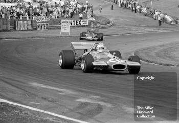 Jack Brabham, Brabham BT33, followed by Jochen Rindt, Lotus 72C,1970 British Grand Prix, Brands Hatch.
