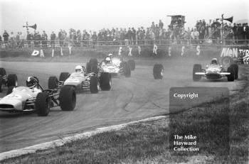 A stray wheel causes chaos at Copse Corner. Pictured are Ray Allen, EMC, John Collings, Peter Deal and Ken Bailey, Martini International Trophy Formula 3 race, Silverstone, 1970.
