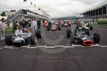Geoff Farmer, Rob Walker Lotus 49B, and Paul Ingram, BRM P126, line up for the Glover Trophy, Goodwood Revival, 1999
