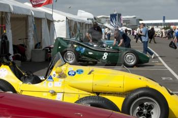 'Toothpaste Tube' 1957 Connaught C type of Michael Steele and the yellow Connaught A4 of David Wenman in the paddock at Silverstone Classic 2010