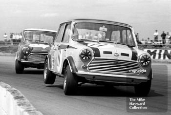Steve Neal, Britax Cooper Downton Mini Cooper S, leads Barrie Williams, Mini Cooper S, at Copse Corner, Silverstone, British Grand Prix meeting 1969. 
