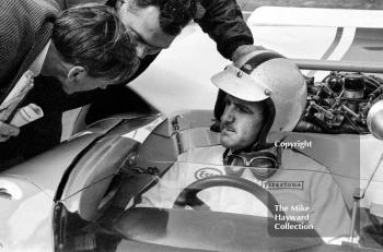 Denny Hulme on the grid in a Lola T70 at the Silverstone 1966 International Trophy.
