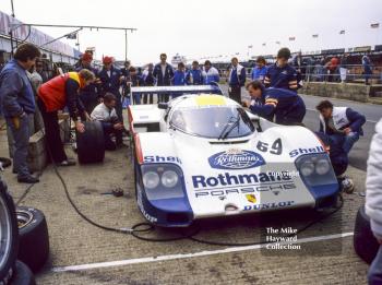 Vern Schuppan, James Weaver, Rothmans Porsche 956 pit-stop during practice, World Endurance Championship, 1985 Grand Prix International 1000km meeting, Silverstone.
