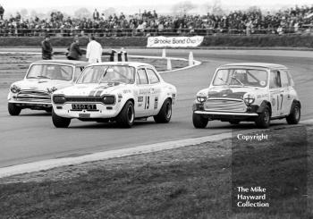 David Morgan, Mini Cooper S, David Mathews, Broadspeed Ford Escort (1300 GT), and Jon Mowatt, Mini Cooper S, GKN Transmissions Trophy, International Trophy meeting, Silverstone, 1971.
