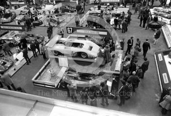 An overall view of the International Racing Car Show at Olympia in 1971, showing the Lola Cars stand.