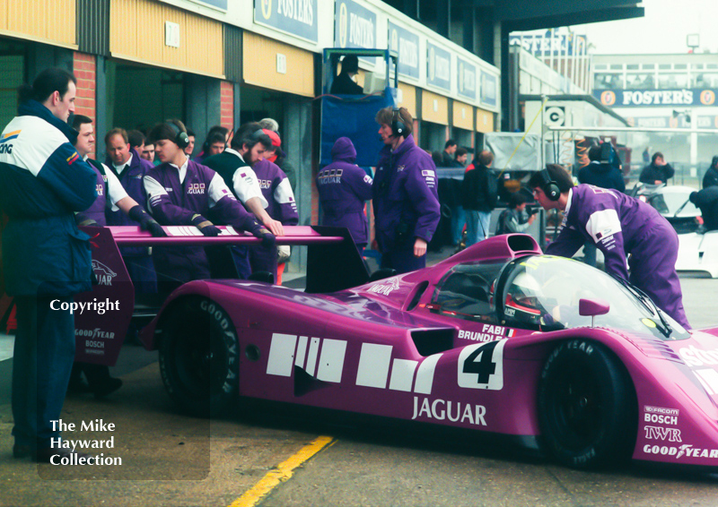 Teo Fabi, Silk Cut Jaguar XJR-14 Cosworth V12, reverses into the pit garage, Castrol BRDC Empire Trophy, World Sports Car Championship, Silverstone, 1991.