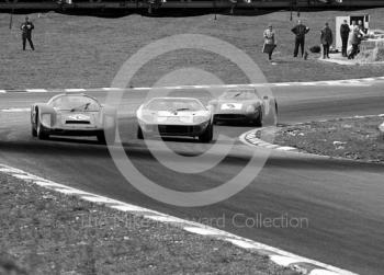 Bill Bradley/Eric Liddell Porsche 906 leads the winning JW Ford GT40 of JackyIckx/Brian Redman and the 5th place Pedro Rodriguez/ Roy Pierpoint Ferrari 250LM at South Bank Bend, 1968 BOAC 500, Brands Hatch
