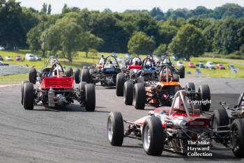 Formula Fords swarm out of Old Hall at the 2017 Gold Cup, Oulton Park.
