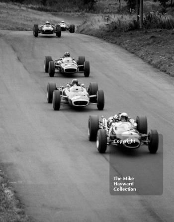 Jack Brabham, Repco Brabham BT19, Jackie Stewart and Graham Hill, BRM P83 H16; Denny Hulme, Repco Brabham BT20 and Jim Clark, Lotus Climax 33, Oulton Park, Gold Cup, 1966.
