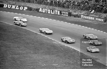 First lap at Paddock Hill Bend, BOAC 500, Brands Hatch, 1968. From the front, the cars and drivers are as follows:<br />
<br />
47 - Digby Martland/Brian Classick, Chevron B8 BMW<br />
43 - Lucien Bianchi/Udo Schutz, Alfa Romeo T33/2<br />
5   - Paul Hawkins/David Hobbs, Ford GT40<br />
49 - Mark Konig/Tony Lanfranchi, Nomad MK.1<br />
16 - Mike Salmon/David Piper, Ford GT40<br />
23 - Chris Ashmore/Jeff Edmunds, Porsche 906<br />
45 - Rico Steinemann/Dieter Spoerry, Porsche 910

 
