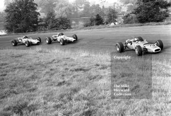 Jean-Pierre Beltoise, Matra Ford MS5-15, leads Graham Hill, Team Lotus Ford 48, and Jo Schlesser, Matra MS5, past the lake into Esso Bend, Oulton Park, Guards International Gold Cup, 1967.
