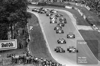 Elio de Angelis, JPS Lotus 97T-3, and Nigel Mansell, Williams FW10/6, lead the pack out of Druids Hairpin, Brands Hatch, 1985 European Grand Prix
