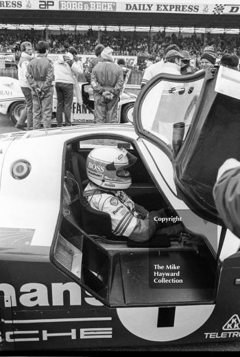 Jochen Mass waits on the grid in the winning Rothmans Porsche 956 he shared with Jacky Ickx, 1985 World Sports Car Championship, Silverstone
